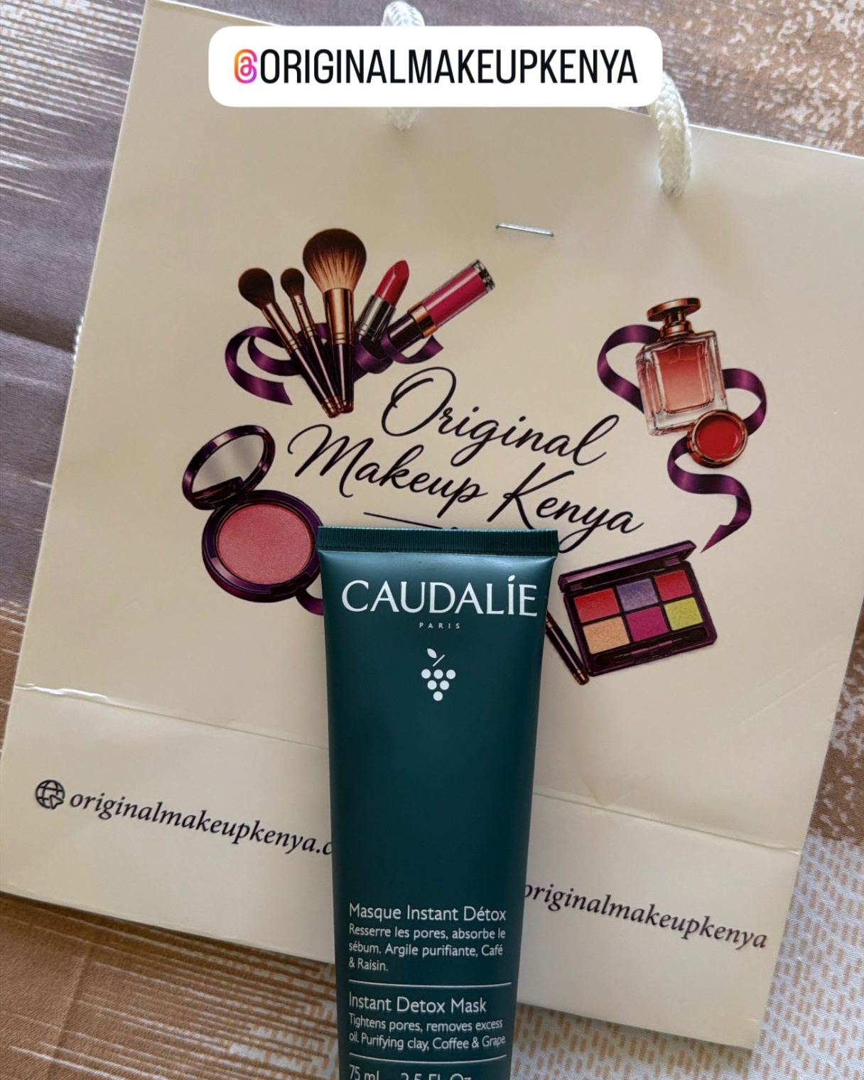 Caudalie Instant Detox Mask on an Original Makeup Kenya shopping bag